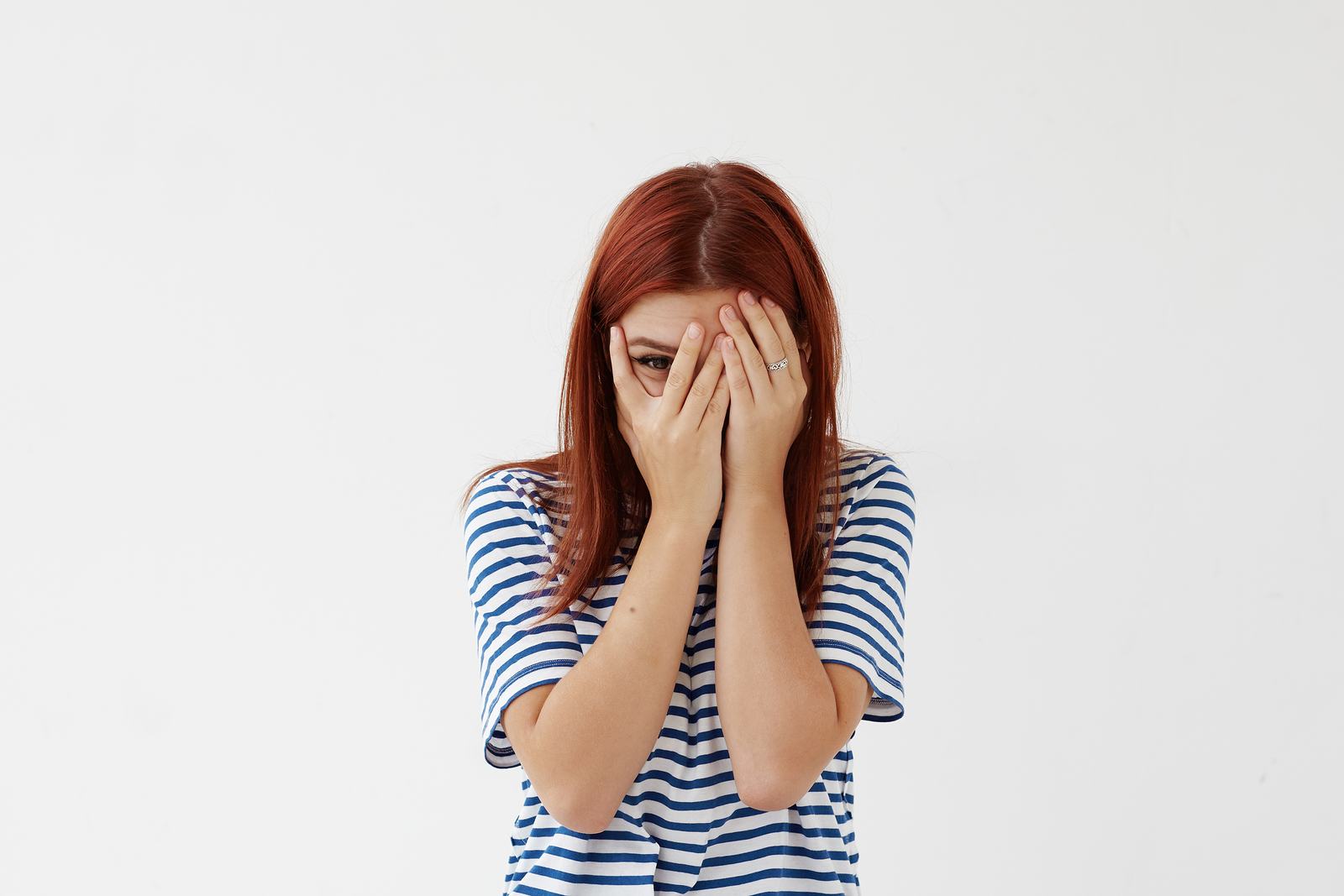 A young woman feels shy and anxious about social situations
